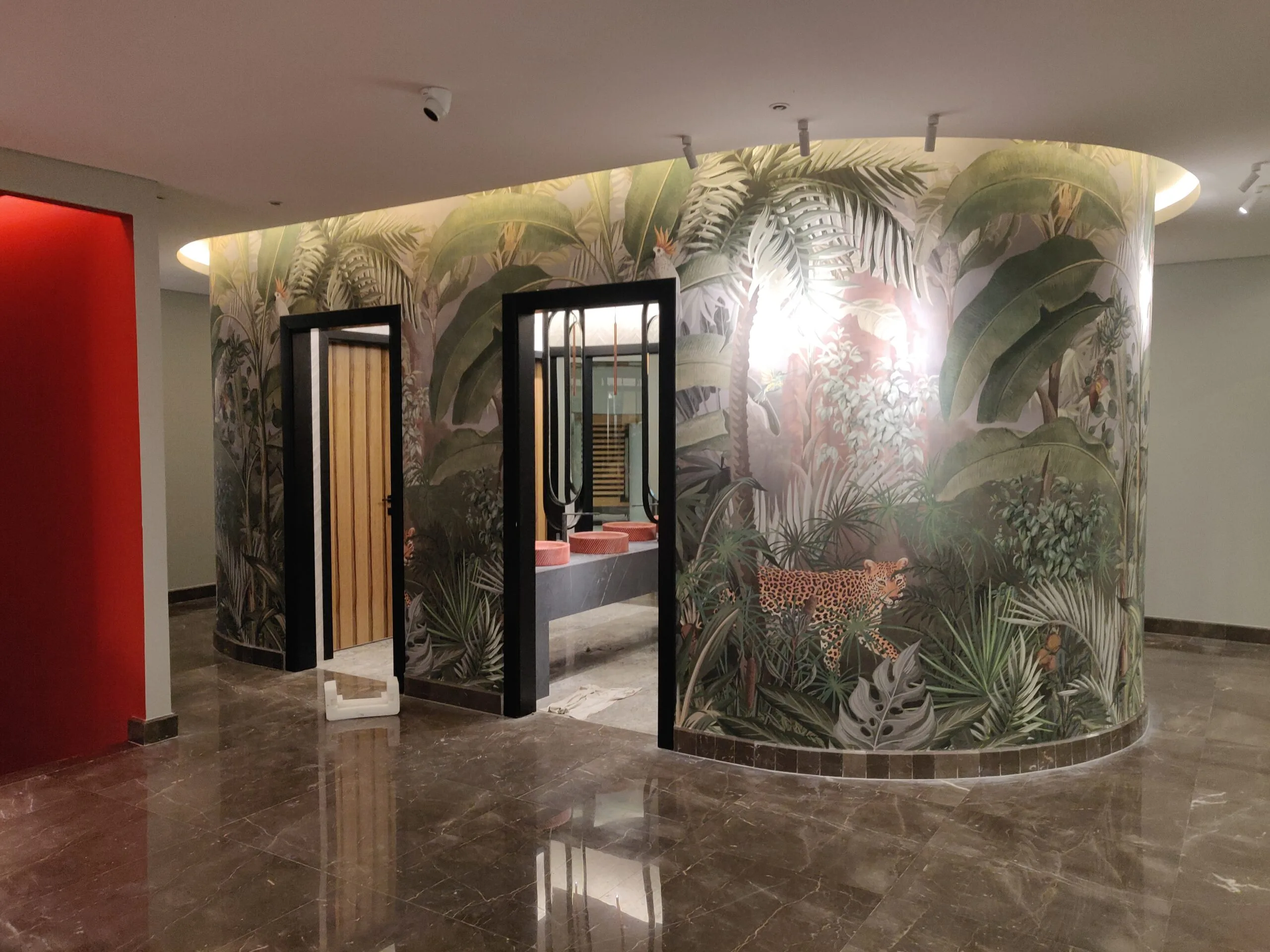 Image illustrating key points about Unique Mural Installation Around the Bathroom in a Minneapolis Restaurant. Wallpaper Twins’ custom mural brings artistry to the bathroom area in this Minneapolis restaurant, seamlessly blending function with design flair.