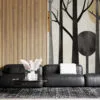 Stylized representation of an abstract forest scene with black tree trunks and warm circular shapes.