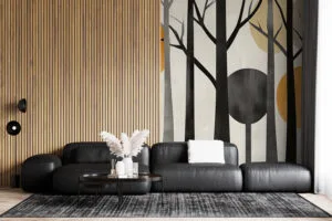 Stylized representation of an abstract forest scene with black tree trunks and warm circular shapes.