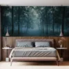 Tranquil forest with tall trees and misty atmosphere.||