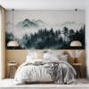 Misty mountainous landscape with tall trees and ethereal ambiance
