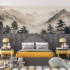 Tranquil mountain landscape with mist and silhouetted trees||