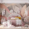 Abstract design with flowing shapes in soft pink|beige|and gray hues.