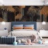 Stylized abstract trees in gold against a black background.