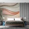 Abstract design with layered wavy shapes in warm neutral colors||
