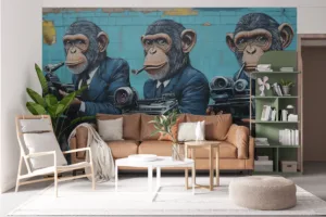 Three anthropomorphic monkeys in suits holding cameras and typewriters in a vibrant urban mural.||