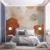 Stylized floral design in orange|cream|and light beige