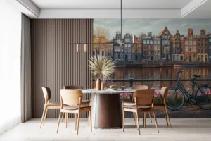 Picturesque canal scene in Amsterdam with blooming tulips and traditional architecture.||