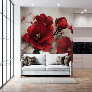 Elegant floral arrangement with red and white flowers and ribbons on a dark marble background.