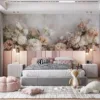 Elegant floral composition featuring white flowers with gold leaves against a peach background.||