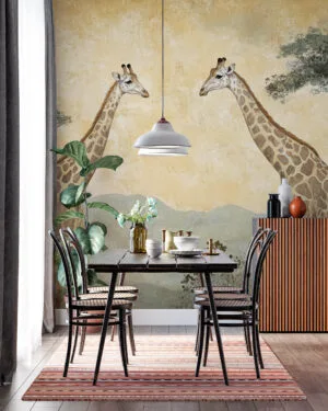 Two giraffes in a natural landscape with trees and rolling hills