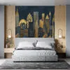 Stylized New York City skyline in Art Deco style with rich gold tones.