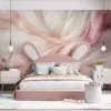 Soft translucent fabrics in pastel colors creating an abstract composition.||