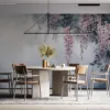 Cascading wisteria flowers in a serene|pastel environment.|