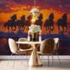 Five horses running along the shoreline at sunset