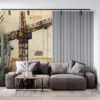 Industrial urban landscape with construction cranes and abstract buildings.||