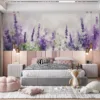 Watercolor painting of lavender flowers in a serene natural setting.||