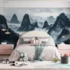 Dramatic mountainous landscape with misty atmosphere||