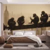 Six monkeys eating ice cream on a beam with a city skyline in the background||