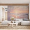 A serene coastal landscape at sunrise with gentle waves and soft pastel colors.
