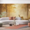 Young deer in a serene forest illuminated by golden light||