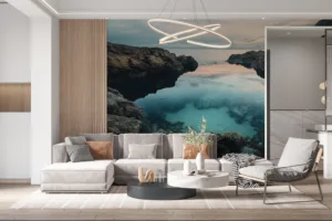 Serene coastal landscape with rocky formations and a calm body of water during sunset.||