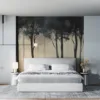 Serene forest scene with tall trees and misty background||