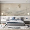 Hot air balloons in a serene mountainous landscape with soft colors.||