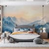 Serene mountainous landscape at sunrise with shades of blue and warm tones