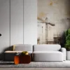 Modern industrial scene featuring construction cranes and buildings under development.||