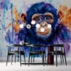 Vibrant watercolor painting of a chimpanzee's face.