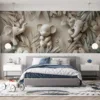 Three stylized elephants surrounded by tropical foliage in a serene setting.||