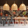 Cartoon monkeys in a theater wearing oversized glasses and enjoying popcorn and drinks.