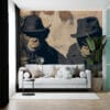 Two anthropomorphic monkeys in dark coats and hats against a textured wall in an urban setting.
