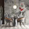 Artistic representation of a clown figure with red lips and classical illustrations in the background.