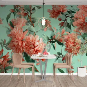 Floral design with coral flowers and green leaves on a mint background.