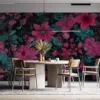 Vibrant floral pattern with pink flowers and teal leaves on a dark background.||