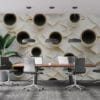Artistic arrangement of coffee cups and broken white plates