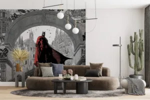 Batman illustrated in a dramatic pose atop gothic architecture||