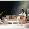 A solitary ballet dancer in a graceful pose on stage with dramatic lighting.||