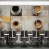 Artistic arrangement of coffee cups on a textured surface||