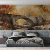 A serene autumn landscape with a stone bridge over a calm river and vibrant foliage.||