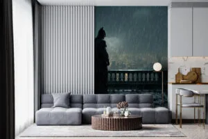 Batman standing on a gothic rooftop in a rain-soaked urban landscape at night.