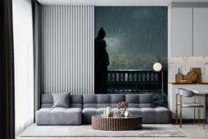 Batman standing on a gothic rooftop in a rain-soaked urban landscape at night.||