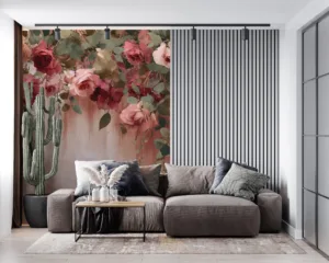 Cascading roses in shades of pink|red|and cream surrounded by green leaves.