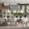 Charming row of urban townhouses with flower boxes and greenery.