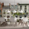 Charming row of urban townhouses with flower boxes and greenery.||