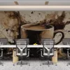 Abstract artwork featuring a coffee cup surrounded by splashes of color.||