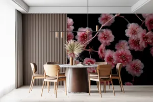 Close-up view of delicate pink blossoms on a black background||