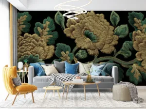 Intricate floral embroidery design with gold flowers and emerald green leaves on a black background.||
